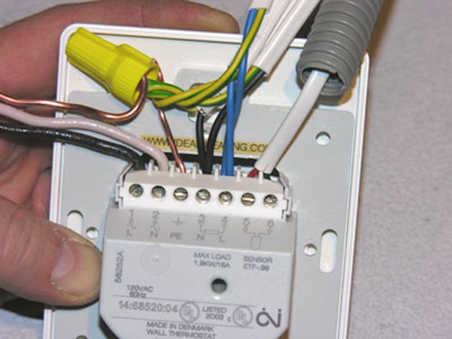 Installation of infrared heaters and thermostat connection