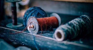 Why is a thread tangled on a sewing machine?