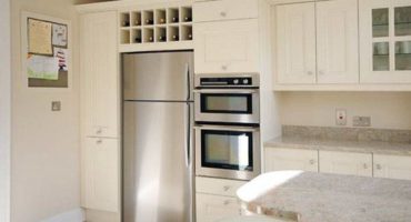 Is it possible to install an oven next to the refrigerator?