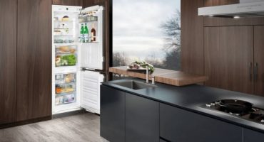 What is the difference between a built-in refrigerator and a regular refrigerator?